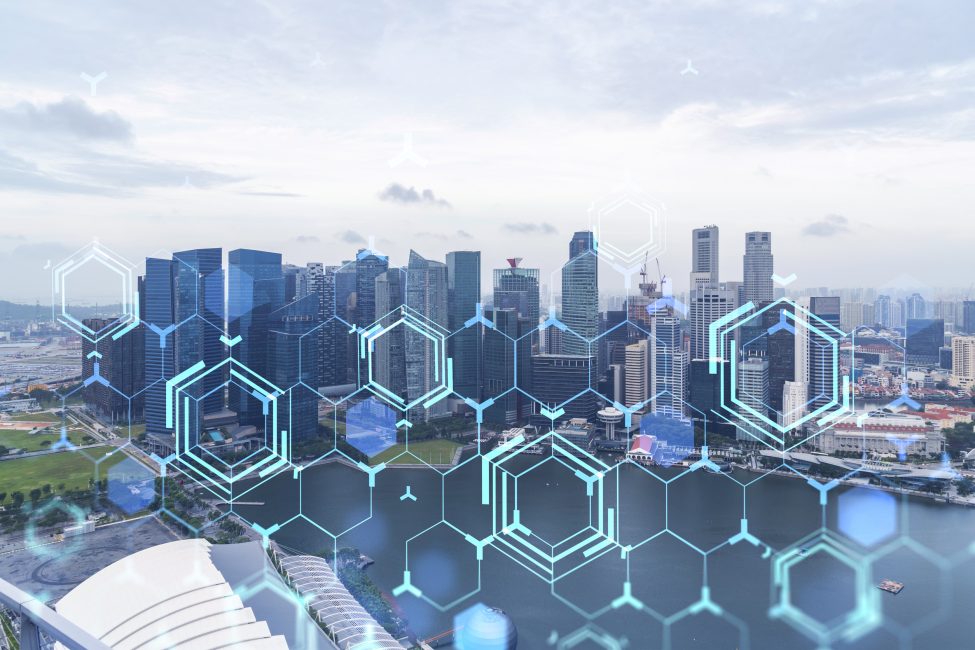 Technology hologram over panorama city view of Singapore. The largest tech hub in Asia. The concept of developing coding and high-tech science. Double exposure. Technology hologram over panorama city view of Singapore