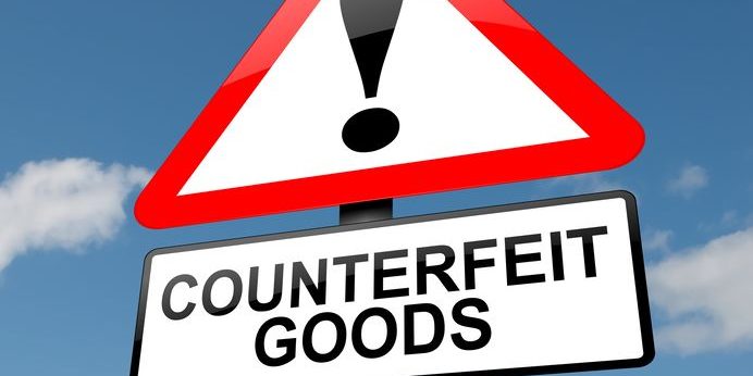 illustration depicting a road traffic sign with a counterfeit goods concept. blue sky background.