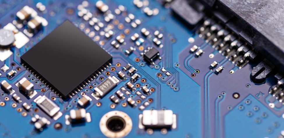 Integrated semiconductor microchip/ microprocessor on blue circuit board
